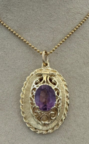 14KT Gold Vintage Amethyst Locket Charm.