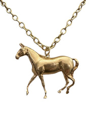 Vintage 14KT Gold Horse pin and charm.