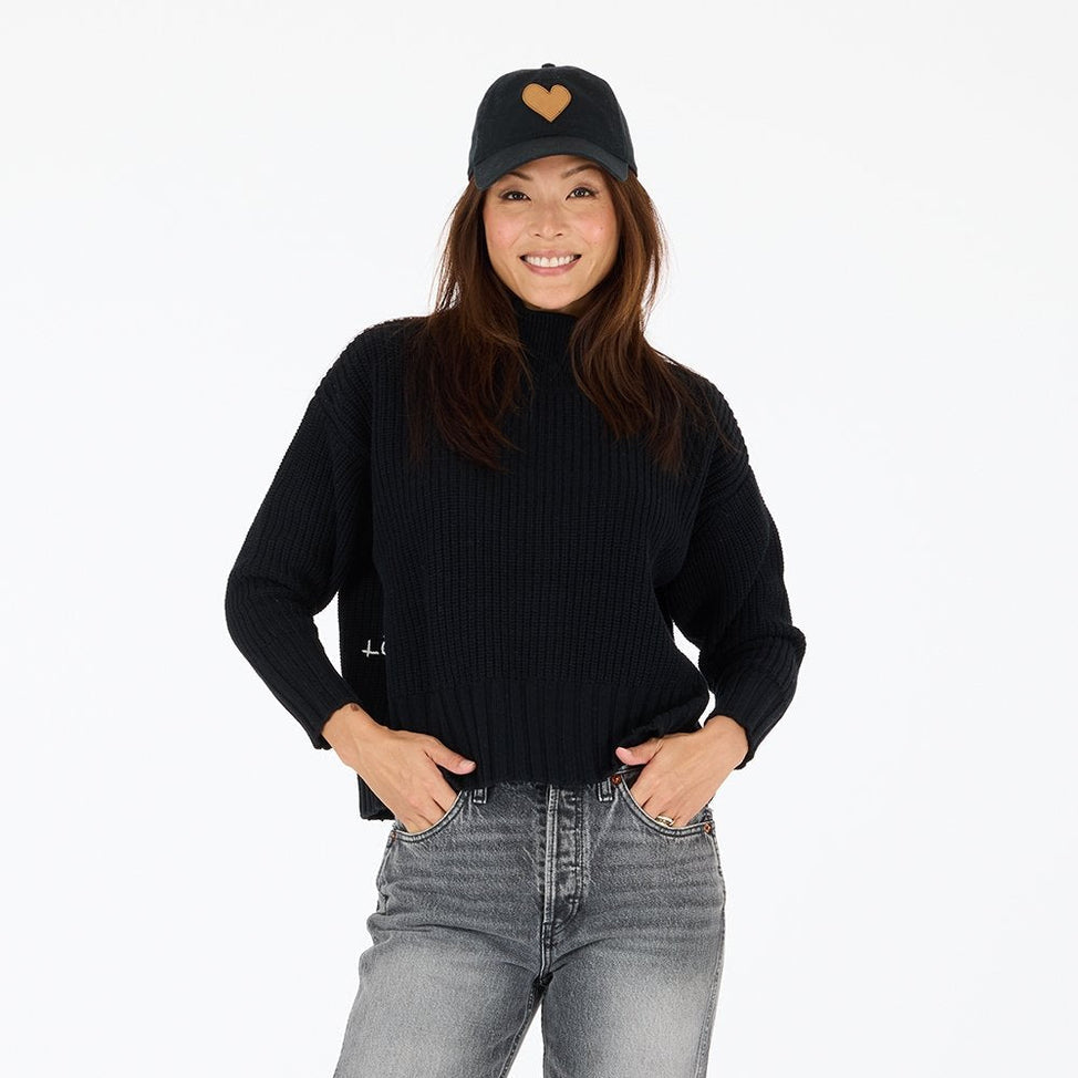 KR253-3409-Marlow_imperfect_heart_elbow_patches_on_black_cotton_sweater_1_974x.progressive_ff501b61-4474-4573-874c-a7d9299243d0.jpg