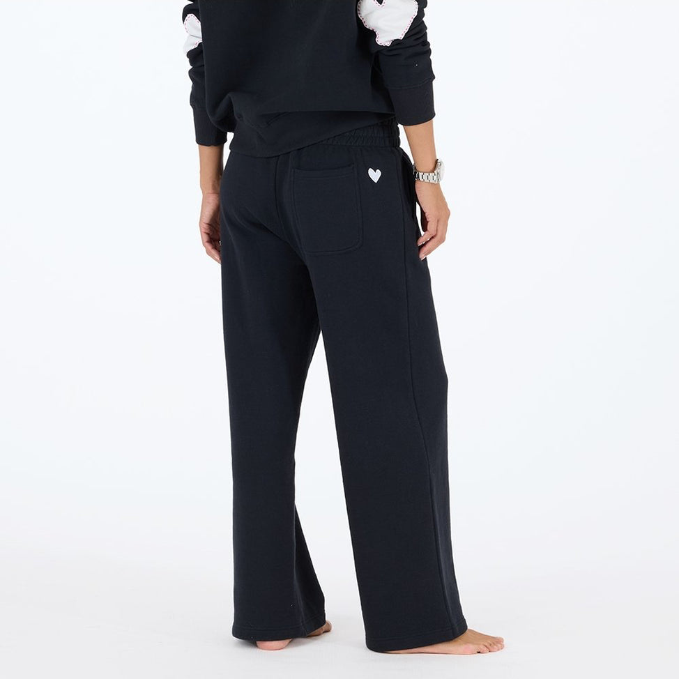 KR253-5117-Weekend_wide-leg_palazzo_black_cotton_fleece_sweatpants_with_pull-on_elastic_waistband_1_974x.progressive_55cee5e4-f472-4922-b4af-396d359f69b6.jpg