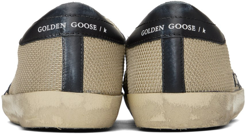 golden-goose-brown-and-black-super-star-sneakers_0dbd34ae-3dc9-4bd4-9fee-204a3dbf3cae.jpg
